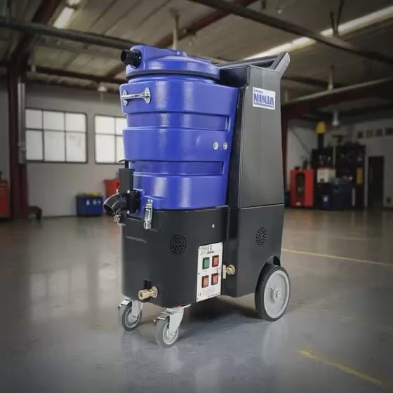 Ashbys Ninja professional carpet cleaning machine with 250 psi pump and dual 5.7-inch 3‑stage vacuum motors in workshop setting.